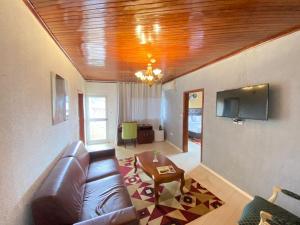 TV a/nebo společenská místnost v ubytování Fini Hotel Bobende