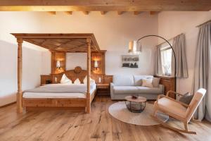 Postel nebo postele na pokoji v ubytování Hotel Stubaierhof