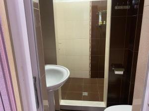 Koupelna v ubytování Hotel Mariana