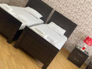 Postel nebo postele na pokoji v ubytování Hotel Mariana