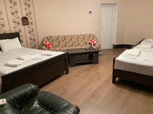 Postel nebo postele na pokoji v ubytování Hotel Mariana