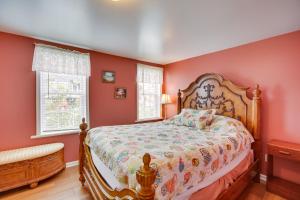 a bedroom with red walls and a bed in a room at Jersey Shore Retreat Near Wildwood Boardwalk! in Wildwood