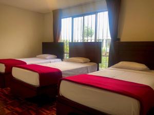 Katil atau katil-katil dalam bilik di NEW INKAWASI ( COZY HOUSE)