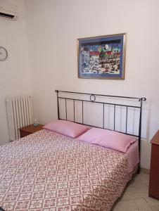 Postel nebo postele na pokoji v ubytování Casa Piacquadio