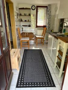 Kuchyň nebo kuchyňský kout v ubytování CSAOL Apartman ház