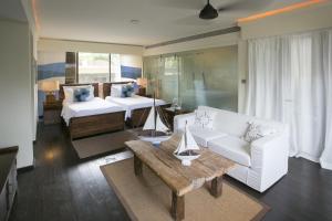Katil atau katil-katil dalam bilik di Dhevatara Beach Hotel +37 gambar