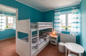 Postel nebo postele na pokoji v ubytování Kukoricza Hacienda