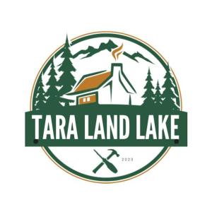 un logotipo para un lodge del lago Tara land en Tara Land Lake en Zaovine