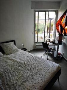 Postel nebo postele na pokoji v ubytování Villa spacieuse et stylée à 50m de la plage