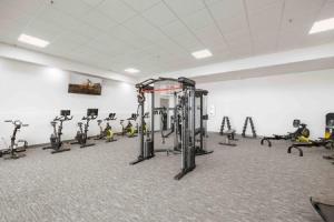 a gym with rows of exercise bikes in a room at Badger Den: 1mi.Snow College~ Wash/Dryer~Climb in Ephraim