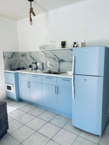 Nhà bếp/bếp nhỏ tại Kenepa Resort