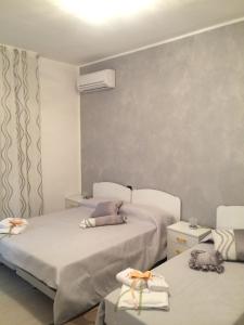 Postel nebo postele na pokoji v ubytování B&B Giorgio La Pira
