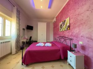 Postel nebo postele na pokoji v ubytování B&B Afrodite