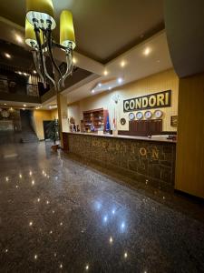 Certificato, attestato, insegna o altro documento esposto da Hotel Condori