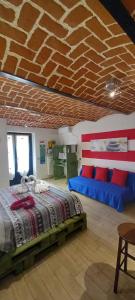 Posteľ alebo postele v izbe v ubytovaní CASA APPARTAMENTO VACANZE La fermata delle rondini + 37 fotografií