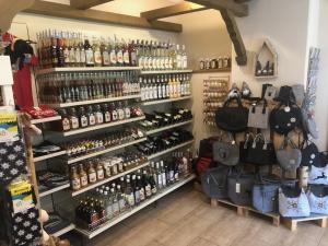 a store filled with lots of bottles of wine at Gästehaus Koch in Berwang