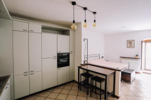 Kuchyň nebo kuchyňský kout v ubytování Flat Mazzini 6