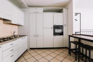 Kuchyň nebo kuchyňský kout v ubytování Flat Mazzini 6