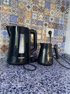 Kavos ir arbatos ruošimo rinkinys apgyvendinimo įstaigoje Yakamoz Villa
