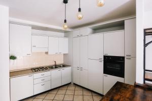 Kuchyň nebo kuchyňský kout v ubytování Flat Mazzini 6