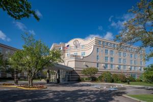 a rendering of the front of a building at Sheraton Boston Needham Hotel in Needham