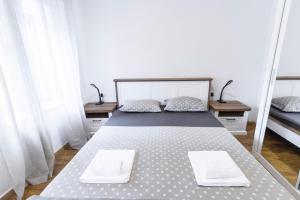 Postel nebo postele na pokoji v ubytování Apartments Florian