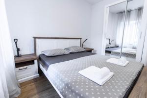 Postel nebo postele na pokoji v ubytování Apartments Florian