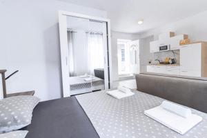 Kuchyň nebo kuchyňský kout v ubytování Apartments Florian
