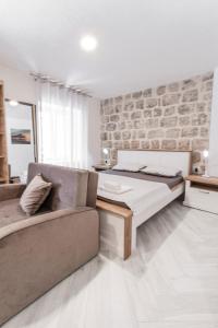 Postel nebo postele na pokoji v ubytování Apartments Florian