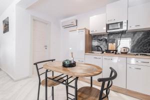 Kuchyň nebo kuchyňský kout v ubytování Apartments Florian