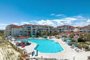an image of a swimming pool at a resort at Oceanview Resort*Hot tub*North Topsail Beach in North Topsail Beach