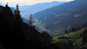 a view of a valley in the mountains at Haus Kartoner in Schladming +9 photos