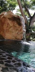 Bazén v ubytování EcoVillas Las Melinas nebo v jeho okolí