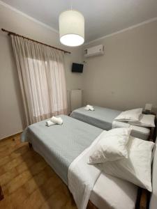 Кровать или кровати в номере Aspasias Traditional Studio