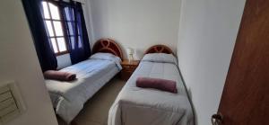 Giường trong phòng chung tại Atalaya