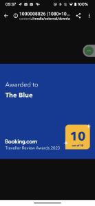 a screenshot of the blue button on a cell phone at "The Blue" eco lodge in Valladolid