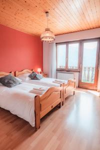 Postel nebo postele na pokoji v ubytování Relais Fleuri