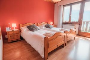 Postel nebo postele na pokoji v ubytování Relais Fleuri