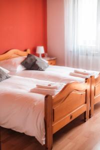 Postel nebo postele na pokoji v ubytování Relais Fleuri