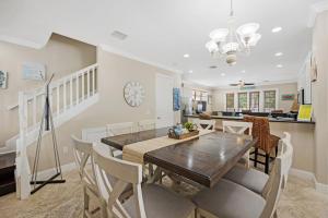 a dining room and kitchen with a table and chairs at Angler's Reef Resort in Islamorada