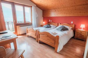 Postel nebo postele na pokoji v ubytování Relais Fleuri