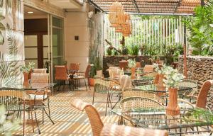 ห้องอาหารหรือที่รับประทานอาหารของ Hotel Poblado Alejandria