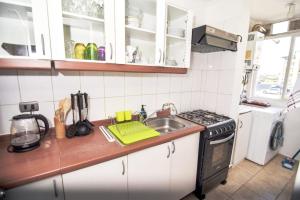 Kuchyň nebo kuchyňský kout v ubytování Apartamento Altos del boldo!!!