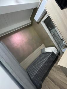 an overhead view of a couch in a small room at Affittacamere Venere in Pietracatella +4 photos
