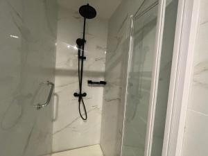 Ванная комната в Hostal Montevideo beachfront