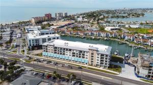 an aerial view of a city with a marina at 5 Star Luxury Beach Condo-Anchor Oasis in St Pete Beach