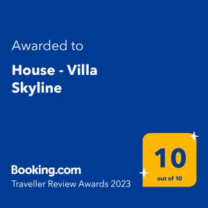SkrbčićiにあるHouse - Villa Skylineの家屋のスカイラインを読む黄色の看板