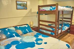 Postel nebo postele na pokoji v ubytování Hostal Triwe