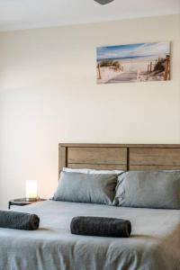 Ein Bett oder Betten in einem Zimmer der Unterkunft Beach Haven at Semaphore