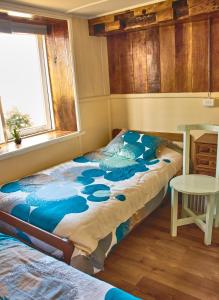 Postel nebo postele na pokoji v ubytování Hostal Triwe